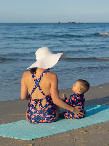 Mom and baby boy in Isla & Ray matching Flamingo print swimwear